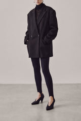 Samia black woven leather pumps worn - Souliers Martinez