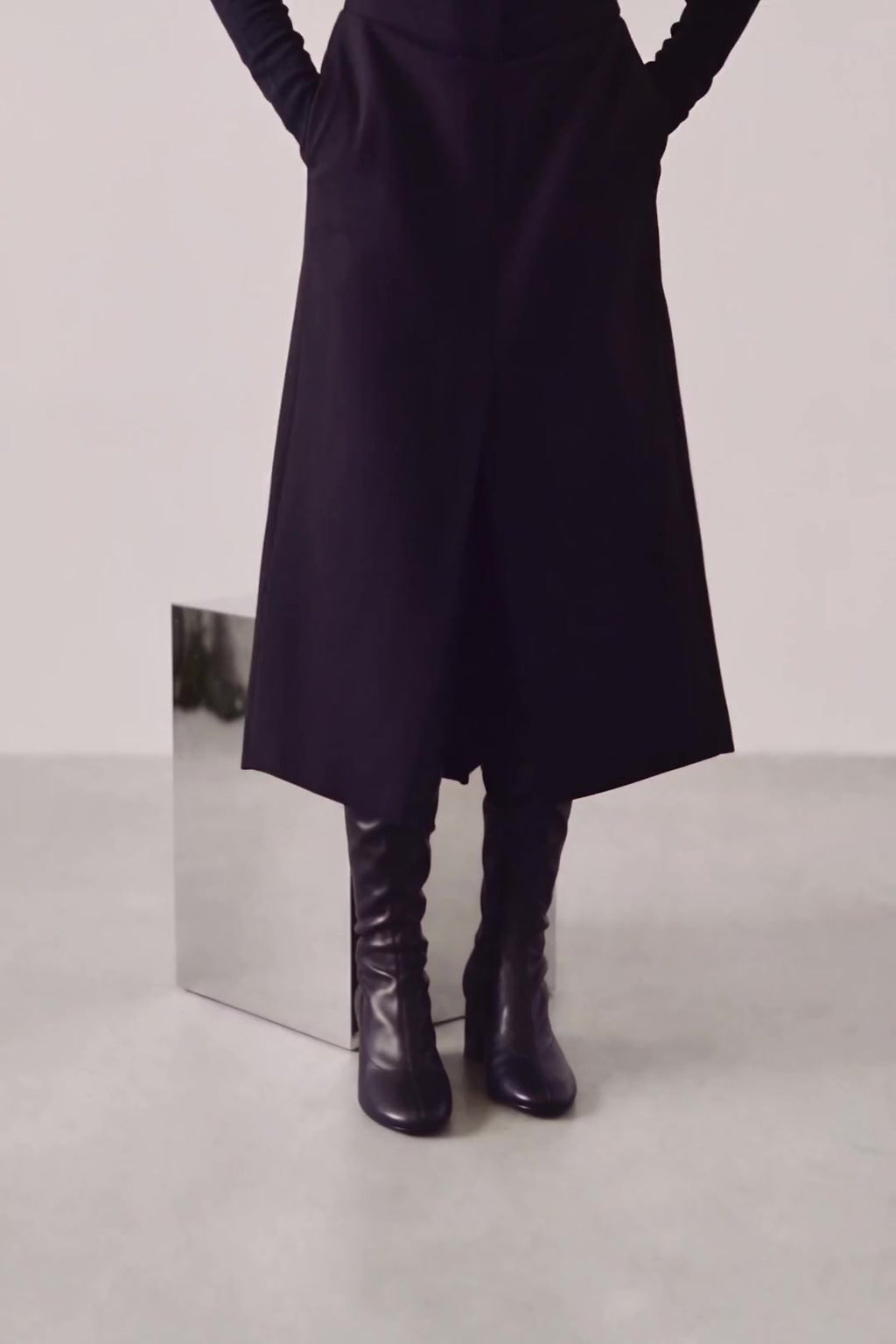 Erika black faux stretch leather knee-high boots worn - video - Souliers Martinez